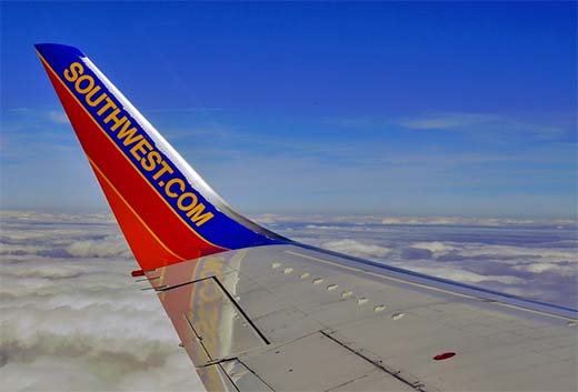 Southwest airlines wing of plane in flight 