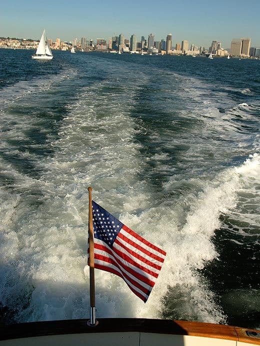 Going to the ocean with yacht flag - San Diego in background